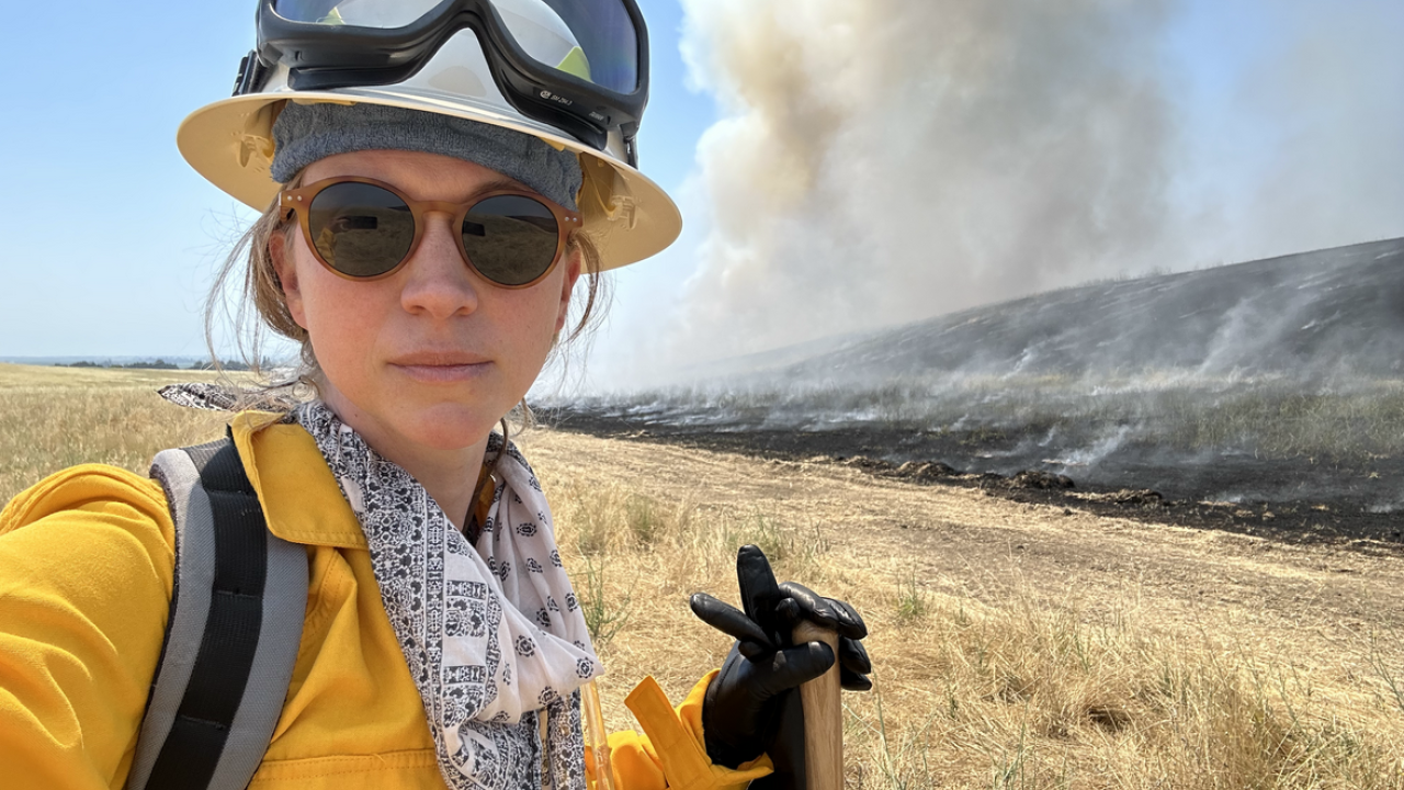 Emily Schlickman at the scene of a prescribed burn