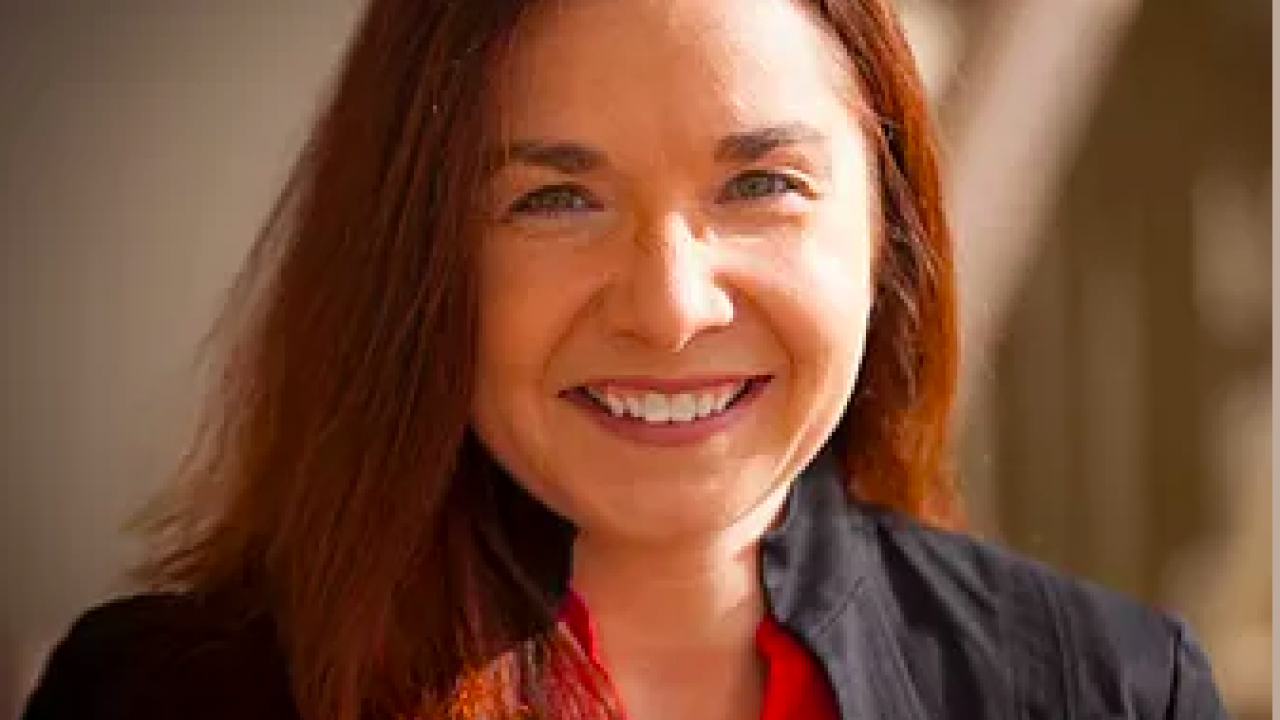 Katharine Hayhoe smiles at the camera.