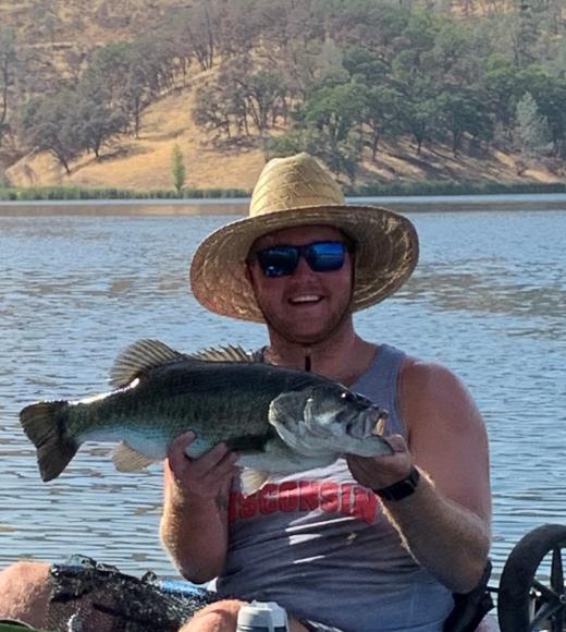 benjamin amann holding a fish