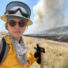 Emily Schlickman at the scene of a prescribed burn